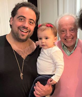 Gustavo Mendes with his father Sergio Mendes and daughter